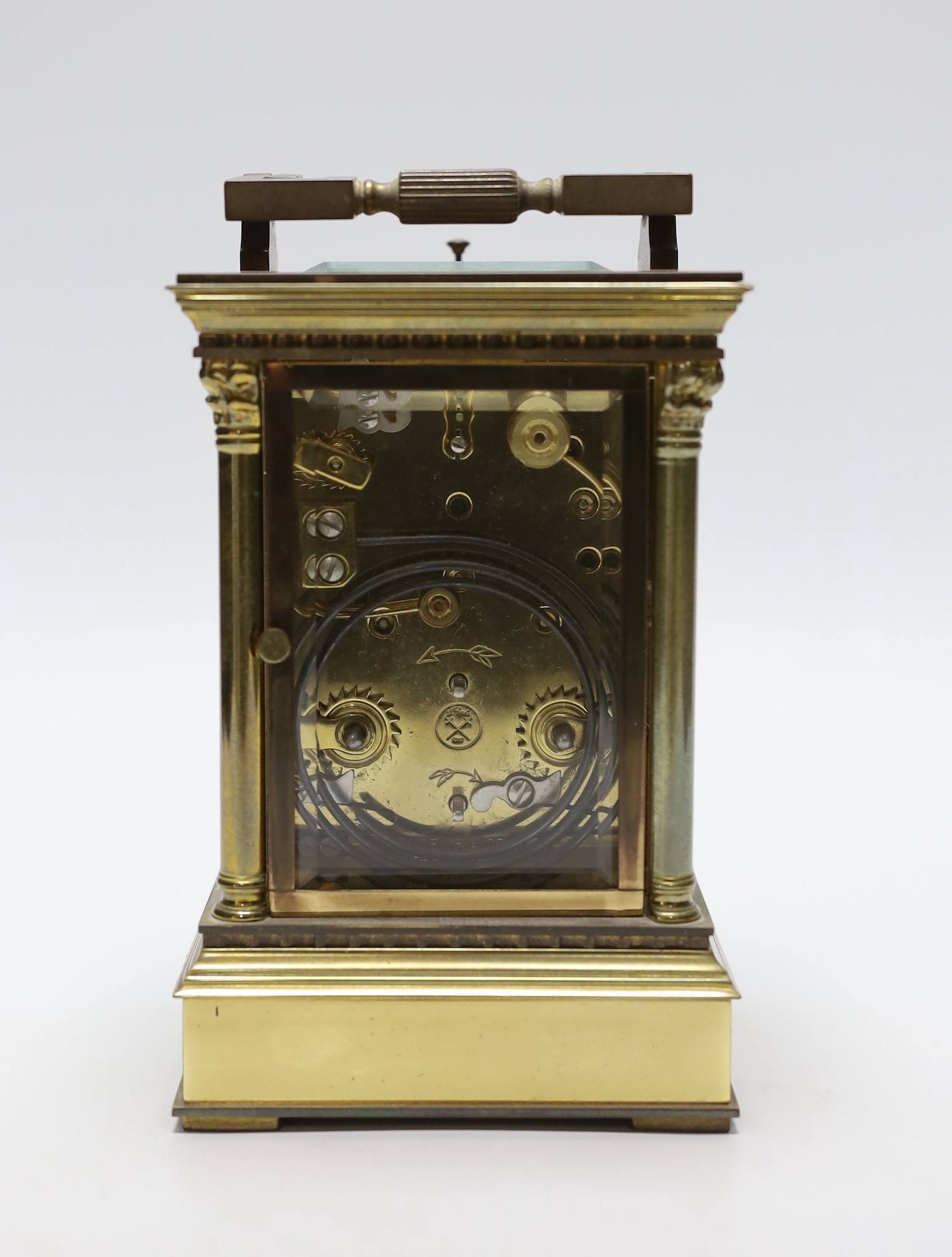 A large brass cased carriage clock retailed by St. James, 17cm